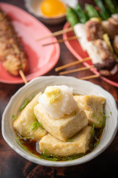istock agedashi tofu, japanese fried tofu with shredded daikon 1261716905