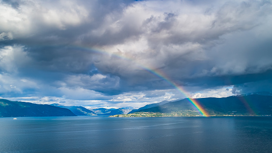 Rainbow over Vik. Vik is a municipality in Vestland county, Norway. It is located on the southern shore of the Sognefjorden in the traditional district of Sogn.