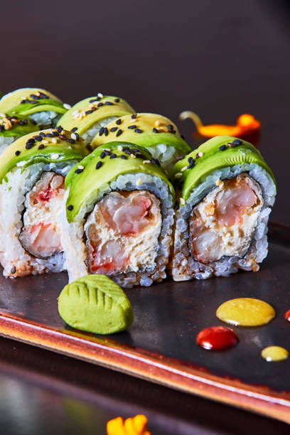 istock Sushi Roll / Avocado and Shrimp. 1261770499