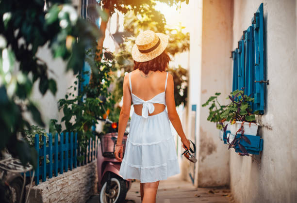 istock Blogger Woman Exploring Streets With Vintage Camera 1261791792