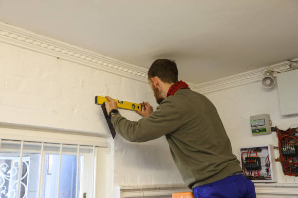 istock A male electrician busy installing a solar panel. 1261797777