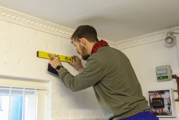 istock A male electrician busy installing a solar panel. 1261797806