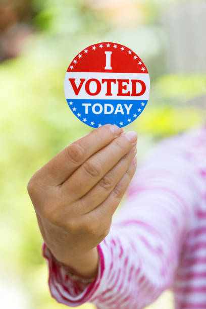 istock Hand holding I voted today sign 1261808986