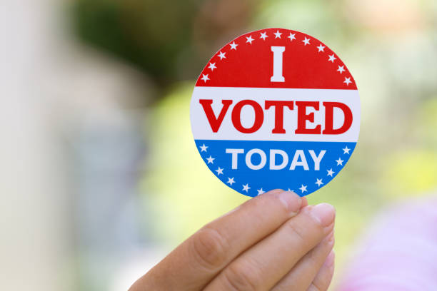 istock Hand holding I voted today sign 1261809535
