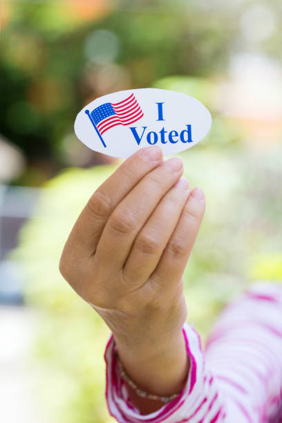 istock Hand holding I voted today sign 1261811672