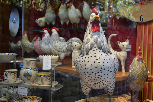 Mont St Michel, France - October, 2019: The Coq Gaulois (the Gallic Rooster) is a traditional national symbol of France and can be found as a decorative motif throughout the country.