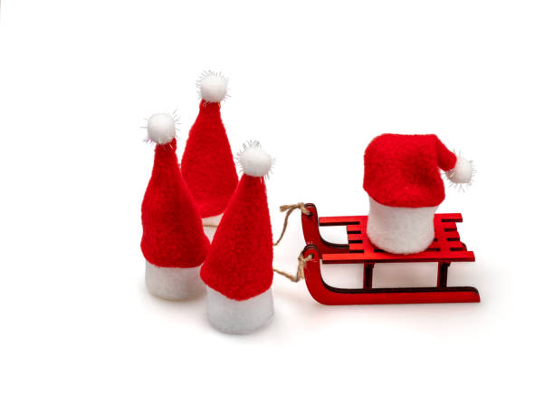istock Santa Claus hat rides on a sled. 1261821374