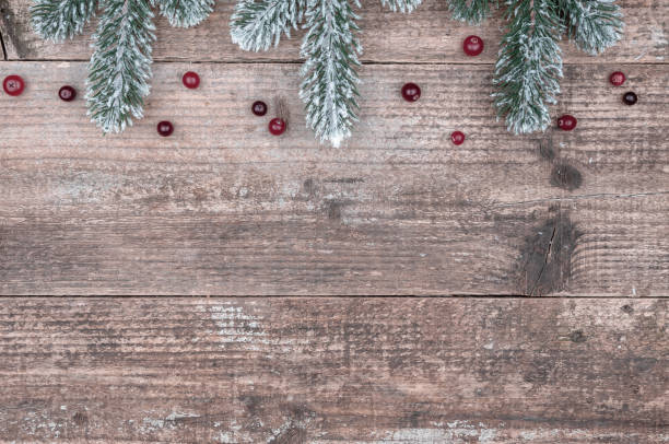 istock Christmas tree branches and red berries for Christmas. 1261826839