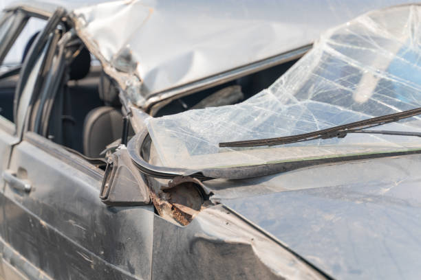 istock car accident, broken car, up-close, selective focus 1261827393