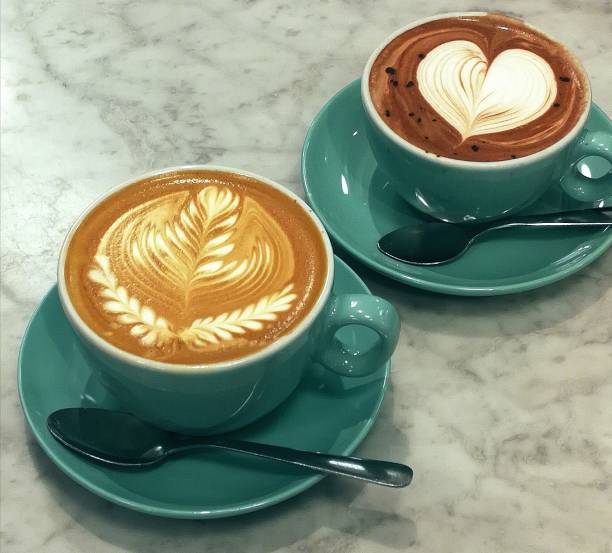Latte Art / Froth Art on a cups of latte and hot chocolate