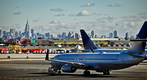 runway with manhattan in the background