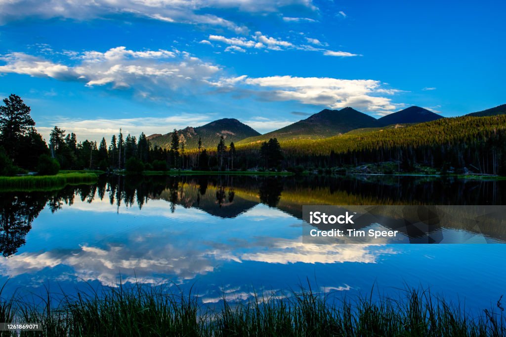 Sprague Lake Golden Hour Twilight at Sprague Lake. Rocky Mountain National Park, Colorado Mirror Lake Stock Photo