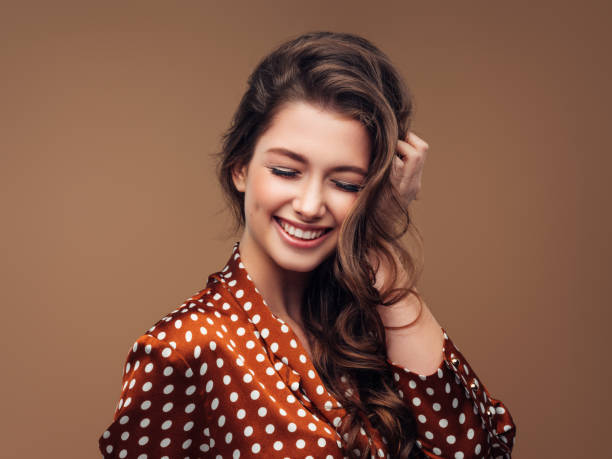 istock Woman with curly hairstyle 1261876638