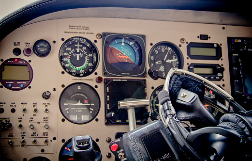 Aircraft cockpit cabin handle, radio headphones and control panel