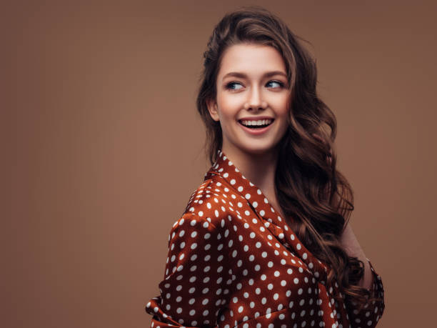 istock Woman with curly hairstyle 1261877672