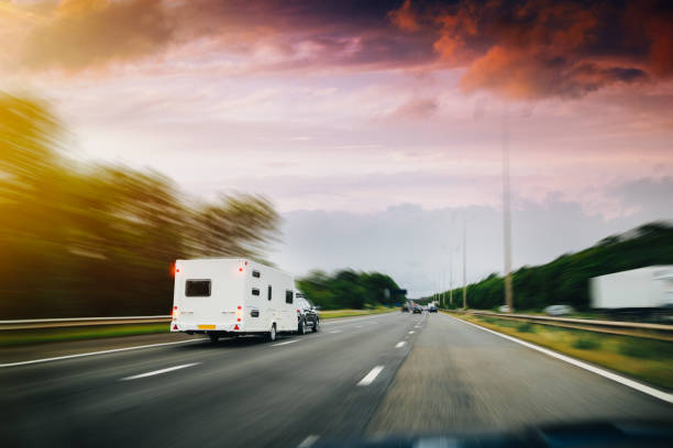 Caravan car travels on the highway.