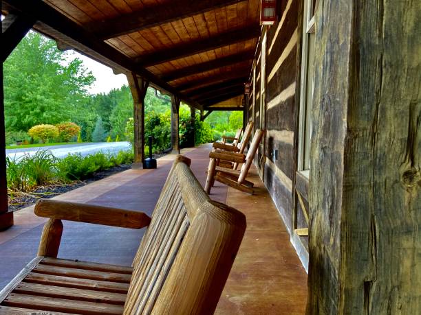 istock Wooden benches on a rustic long porch 1261912281