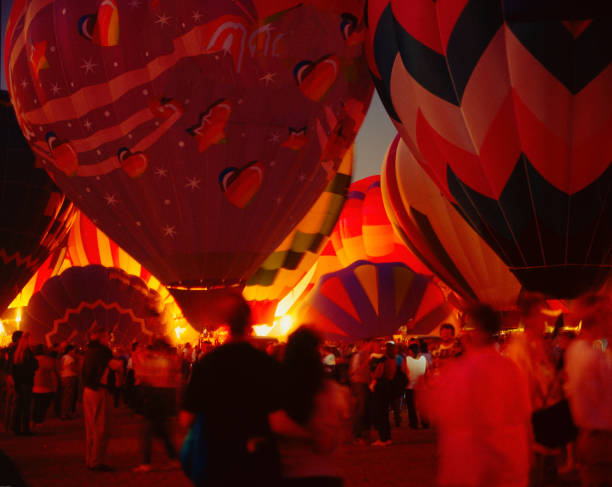 Albany, Oregon, USA - August 23, 2013: Hot-Air Balloons inflate for Night Glow at the ATI Northwest Art and Air festival. This annual event is held at Timber Linn Park in Albany Oregon. The balloons do not launch, but inflate to show their beauty in low light.
