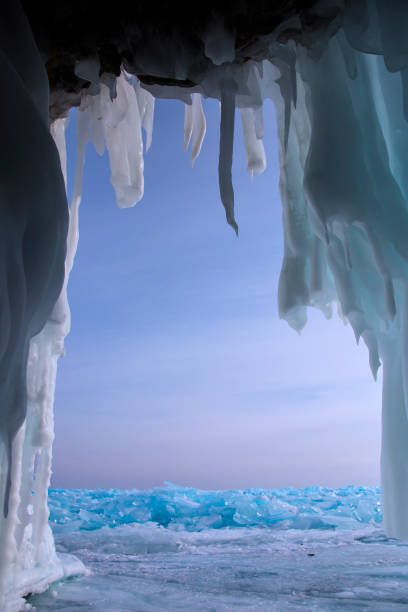 istock Lake Baikal in winter. Beautiful views under ice 1261957796