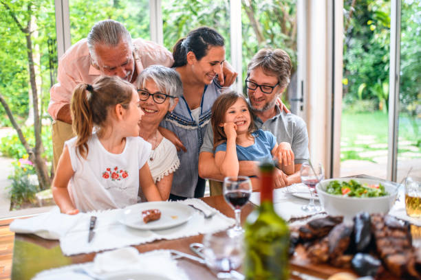 istock Buenos Aires Family Affection at Dining Table Before Lunch 1262024701