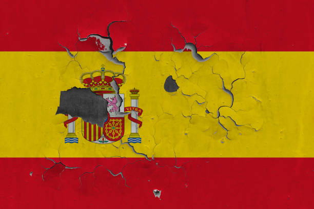 istock Spain flag close up old, damaged and dirty on wall peeling off paint to see inside surface. Vintage National Concept. 1262026464