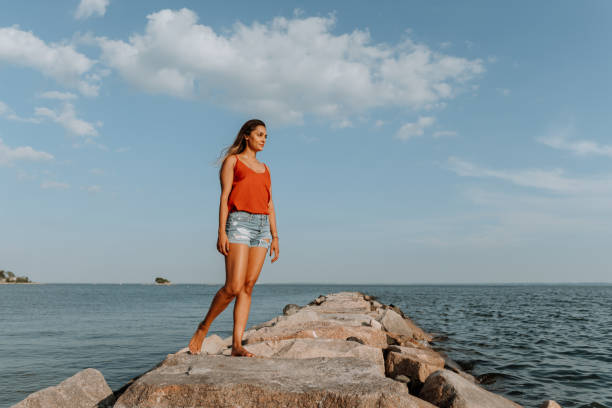 istock Woman spending a Sunday at the beach 1262031682