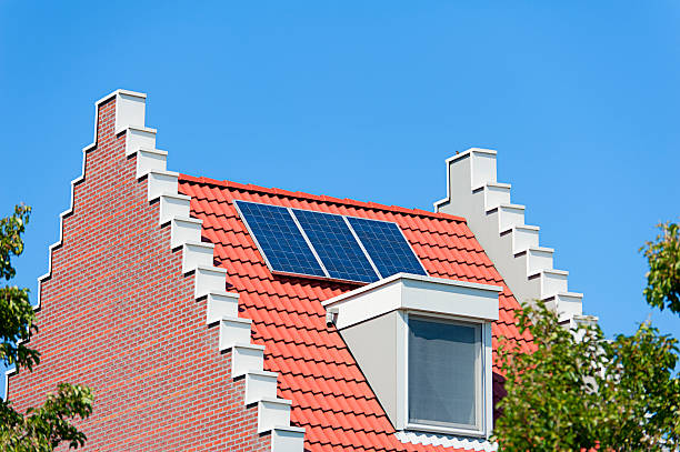 Modern Dutch house with solar panels on roof  adac stock pictures, royalty-free photos & images