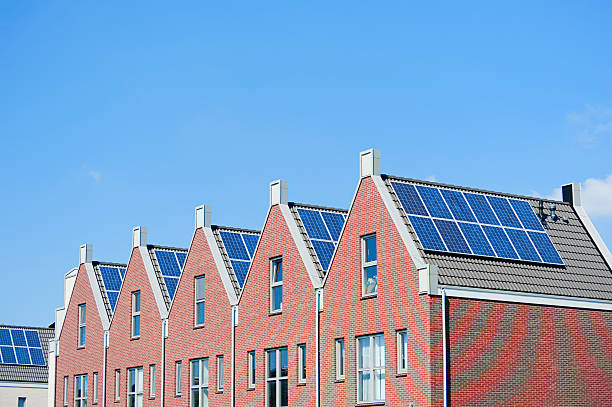 istock Modern Dutch houses with solar panels on roof 126203729