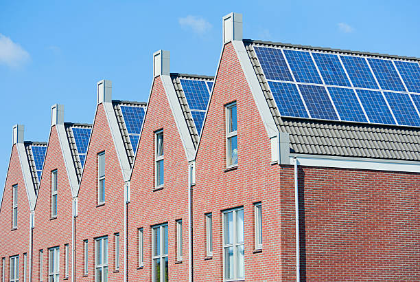 istock Modern Dutch houses with solar panels on roof 126203799