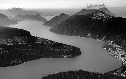 A black and white aerial shot of Lake Lugano from on top of Fronalpstock, taken on a hike.
