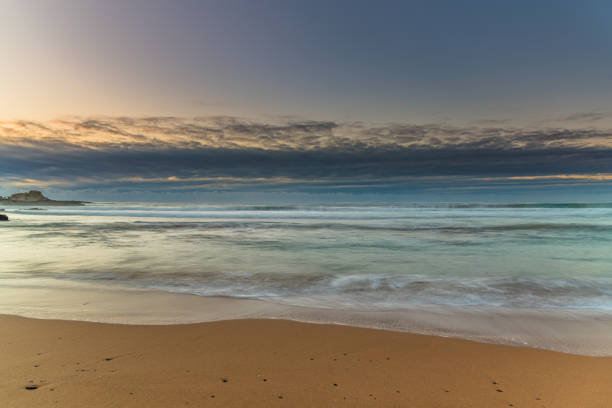 istock Sunrise seascape and low cloud bank 1262043265