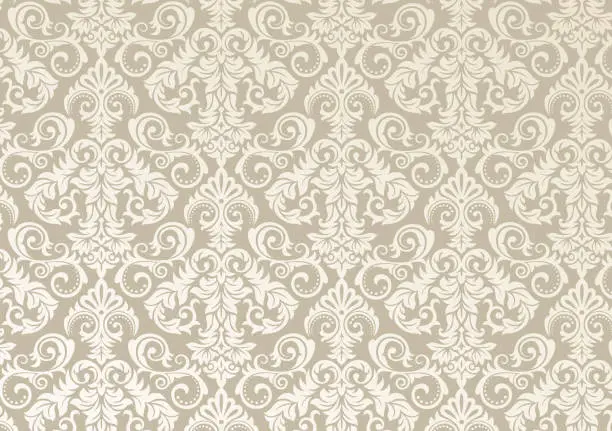 Photo of Beautiful damask pattern of brown and beige colors. Royal design with floral ornament.