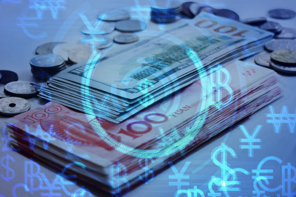 istock Bank note and coin stack with currency symbols 1262076648