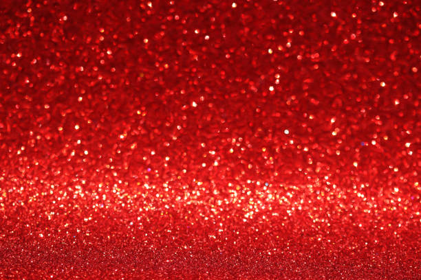 istock Red glitter texture christmas abstract background, Defocused 1262086483