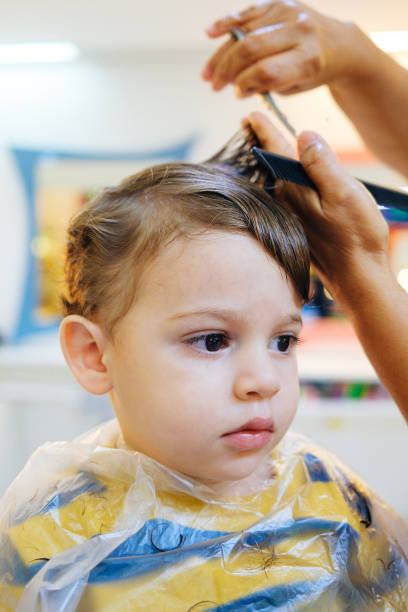 istock Boy toddler getting a haircut 1262090214