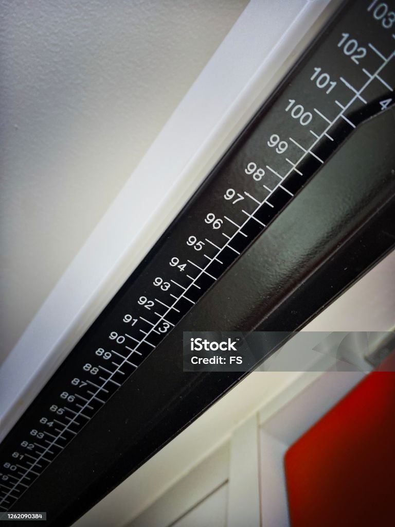 Measurement on a Doctor’s Scale Accuracy Stock Photo Measurement on a Doctor’s Scale Accuracy Stock Photo