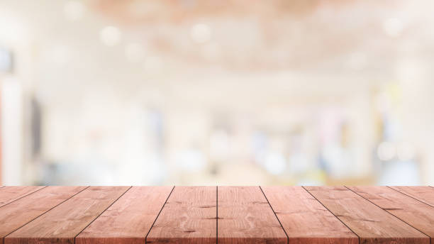 istock Empty white marble stone table top and blur glass window interior restaurant banner mock up abstract background - can used for display or montage your products. 1262099956