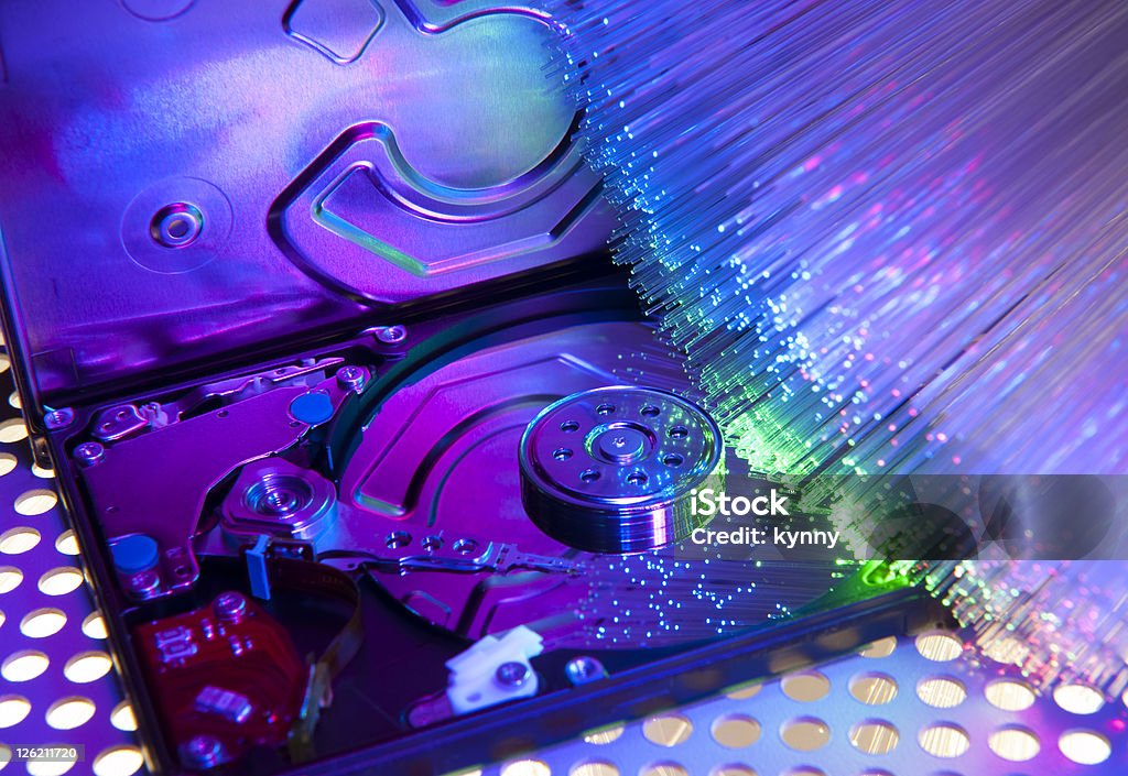 コンピュータ harddisk および光ファイバの技術的背景 - カラー画像のロイヤリティフリーストックフォト