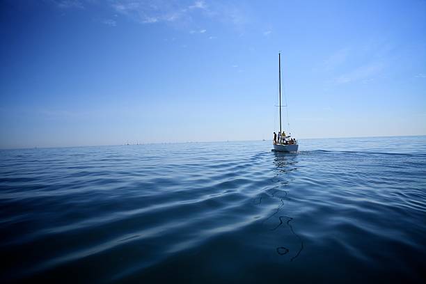 istock Sail boat on blue tranquil water 126215112
