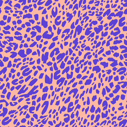 Seamless pattern made of leopard spots skin texture. African animal fur background. Spotted ornament. Vintage style. Good for wrapping, banner, fashion, textile and fabric.