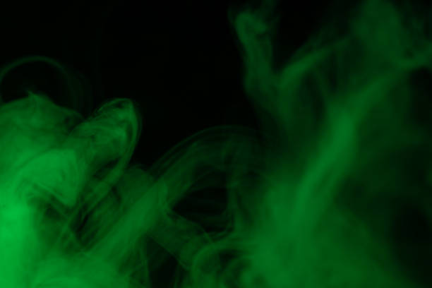 istock Green steam on a black background. 1262154108