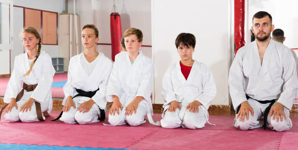 istock Kids taekwondo group ready to practice 1262160045