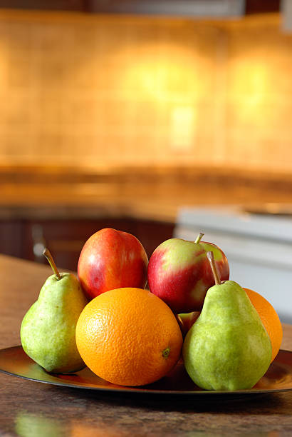 istock Fruit on a wooden plate 126217305
