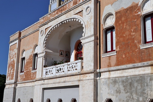 Santa Cesarea Terme, Puglia, Italy - June 29, 2020: Glimpse of Palazzo Sticchi, the nineteenth-century Moorish style villa that characterizes the town
