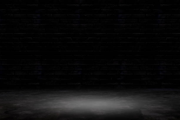 istock old grunge dark room or empty black room with spotlight to concrete ground for interior decoration, studio or advertising concept 1262197432