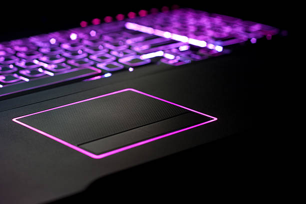 istock Purple Laptop Focus on Touchpad 126219951