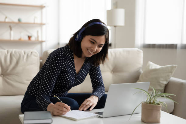 istock Smiling Asian girl study online on laptop 1262199830