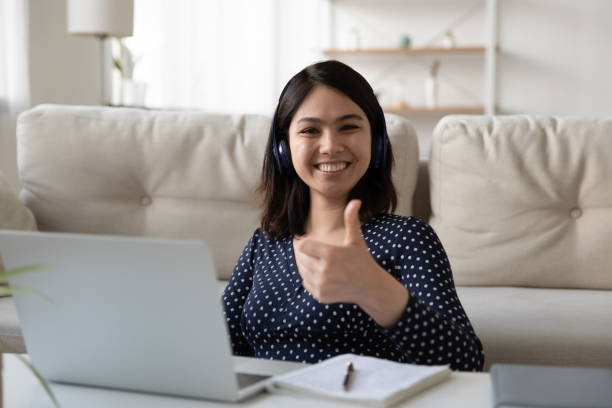 istock Portrait of smiling Asian girl recommend distant study course 1262199832