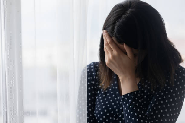 istock Unhappy woman feel distressed crying at home 1262199864