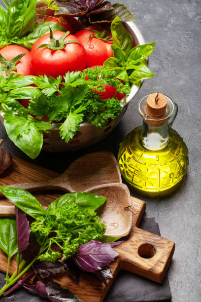 istock Italian cuisine ingredients. Tomatoes, herbs and spices 1262217401